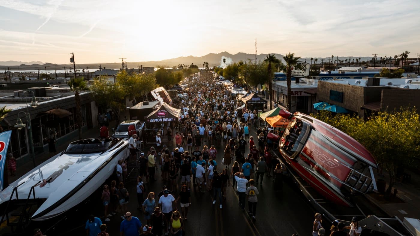 McCulloch Boulevard packed at sundown, mountains behind